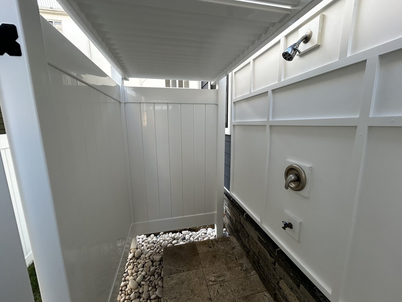 North Wildwood NJ outdoor shower interior pebble drain stone ledger