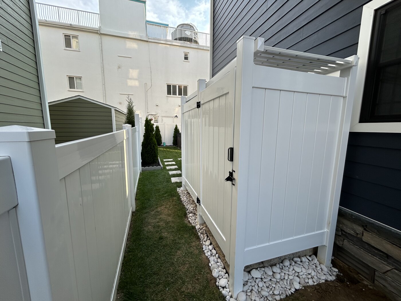 North Wildwood NJ outdoor shower white enclosure stepping stones