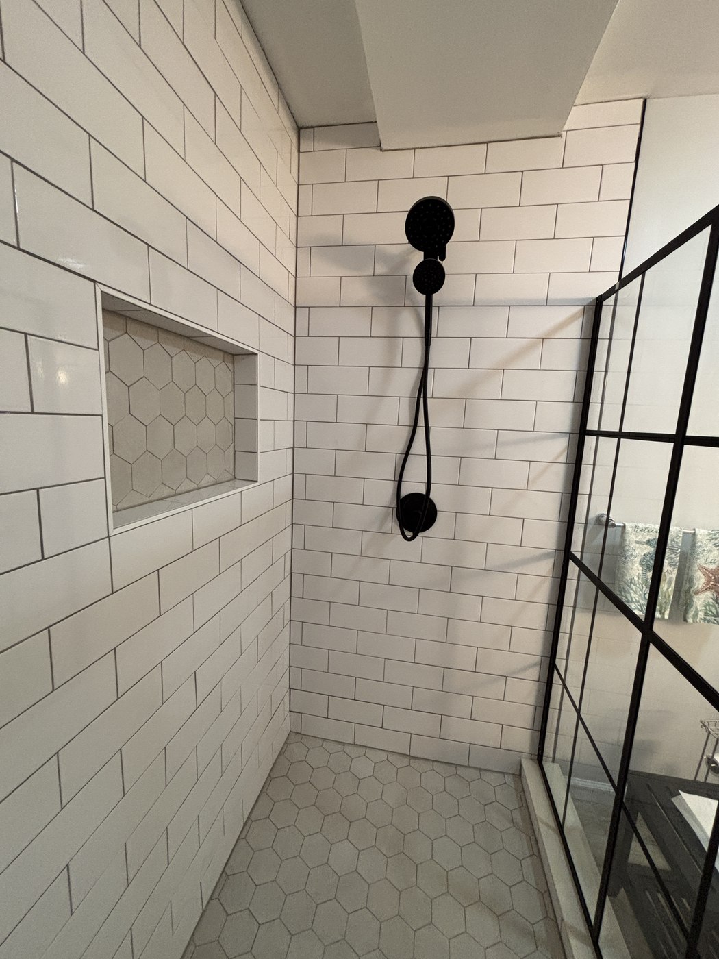 Wildwood NJ bathroom shower interior black fixtures niche